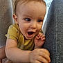 Jules a rejoint le concours — aidez-le/la à gagner de superbes lots ! toddler, child, baby, yellow_clothing, couch, fabric, indoor, curious, reaching, face, hand, floor, expression, movement, person, furniture, home, excitement, skin, hair