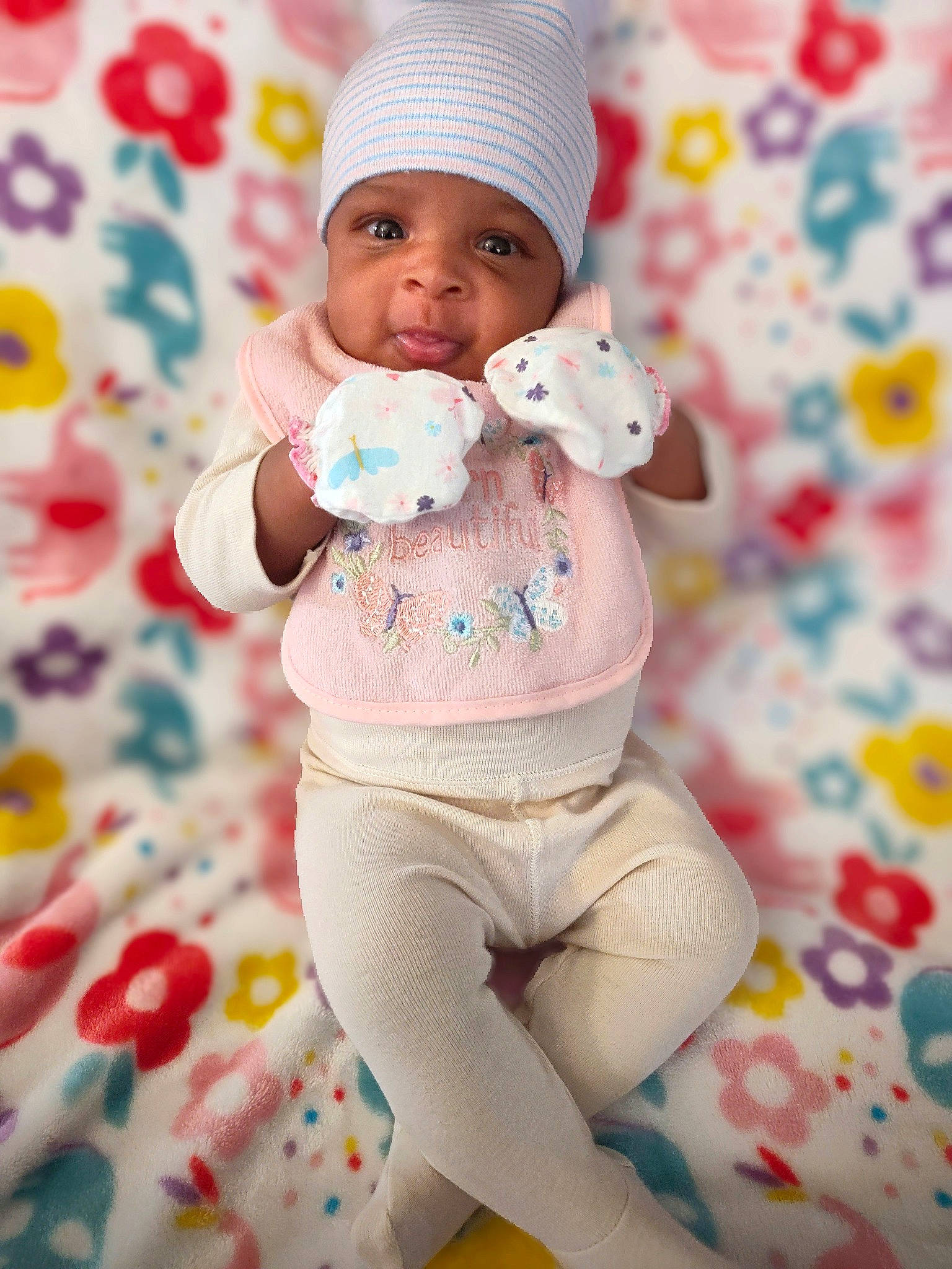 Onyx joined the competition — help win amazing prizes! abdomen, baby, baby_products, baby_toddler_clothing, cap, child, fashion_accessory, happy, headwear, knit_cap, linens, magenta, pattern, person, pink, sitting, skin, sleeve, t_shirt, textile