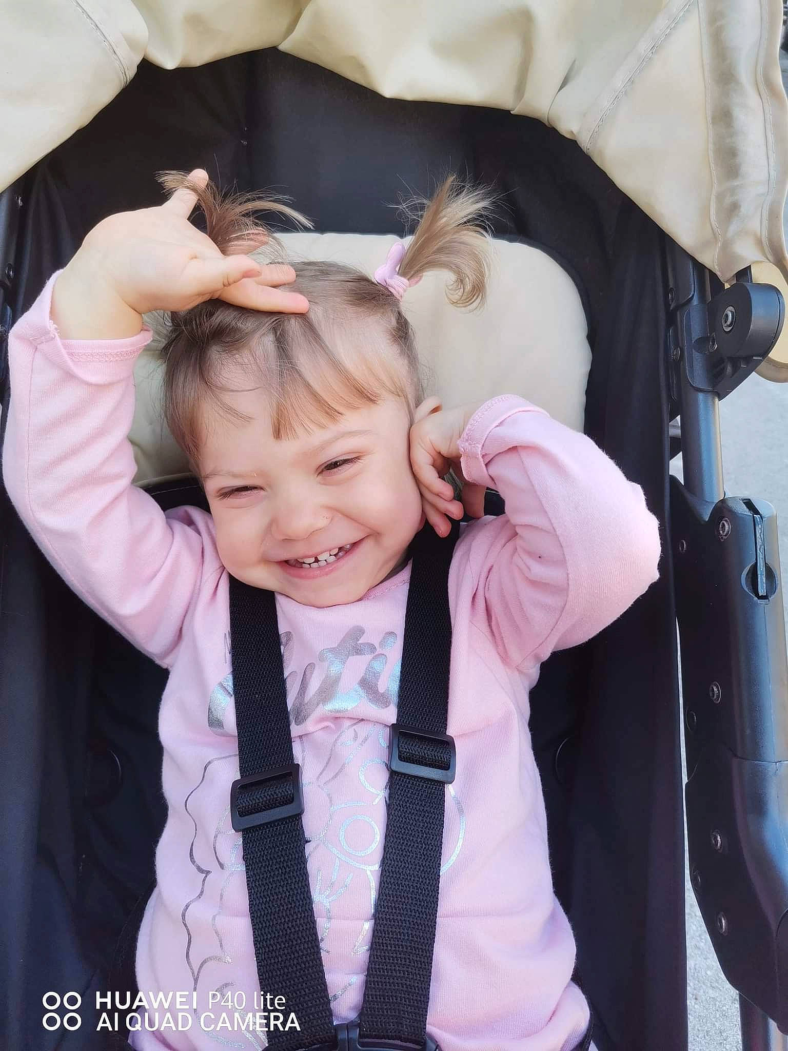 Gabriela is registered to the contest to win money with this photo: baby_toddler_clothing, child, comfort, cool, dress_shirt, formal_wear, gesture, hair, hairstyle, happy, joy, neck, outerwear, person, pink, shoulder, skin, sleeve, smile, suit