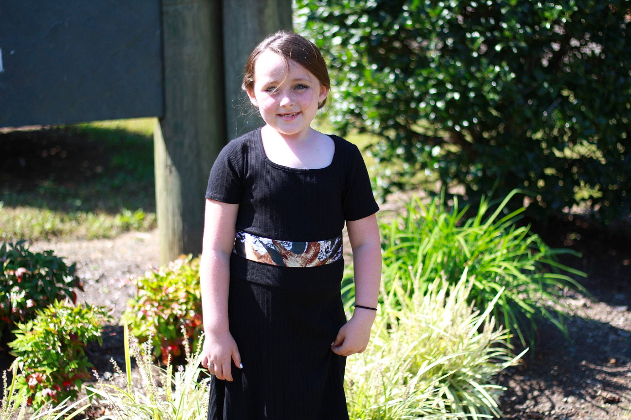 Spirit is registered to the contest to win money with this photo: annual_plant, child, eyewear, fun, grass, grass_family, hairstyle, joy, landscape, landscaping, leisure, people_in_nature, person, plant, shrub, sleeve, spring, standing, summer, t_shirt