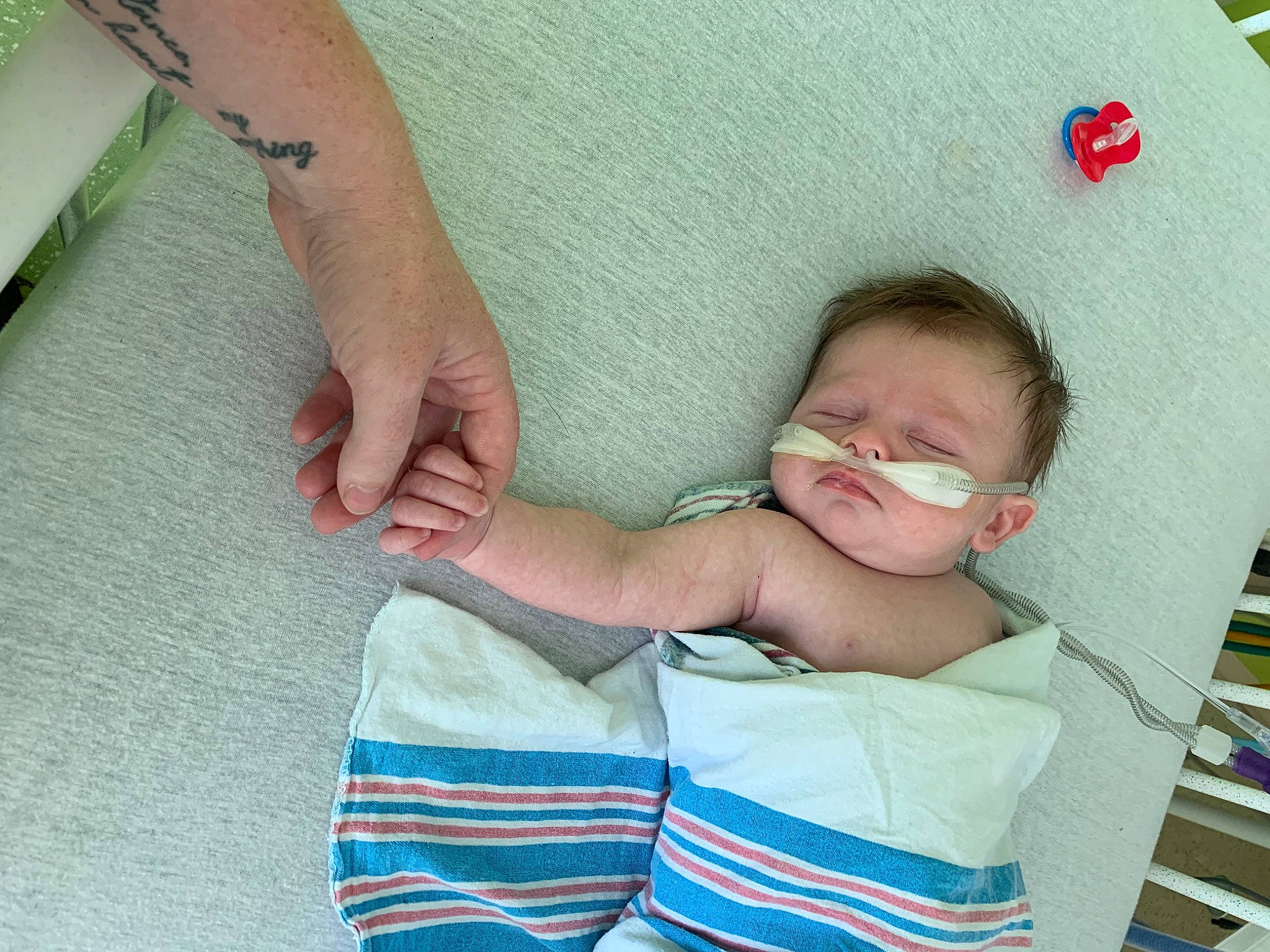 Colt joined the competition — help win amazing prizes! arm, baby, baby_products, baby_toddler_clothing, bookcase, child, comfort, elbow, finger, gesture, glasses, hand, linens, nail, person, room, skin, textile, thumb, toddler