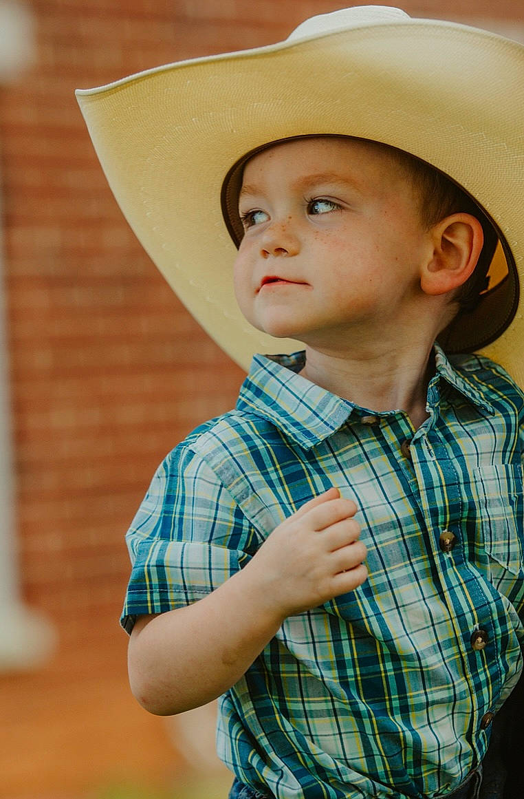 Chase is registered to the contest to win money with this photo: cap, chin, clothing, collar, dress_shirt, face, hairstyle, happy, hat, head, headgear, headwear, lip, neck, nose, person, plaid, shirt, skin, sleeve