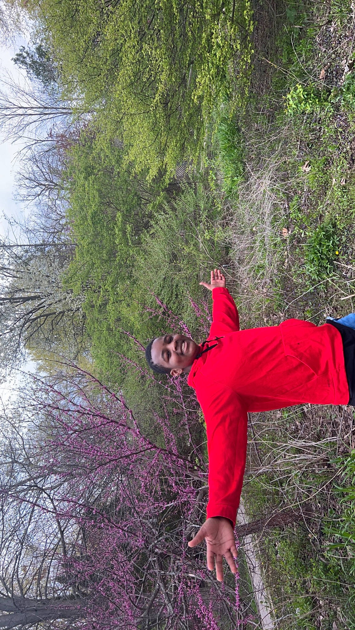 Izzy is registered to the contest to win money with this photo: branch, forest, fun, grass, grass_family, grassland, joy, landscape, leisure, magenta, natural_landscape, people_in_nature, person, plant, rock, shrub, soil, tints_and_shades, tree, trunk