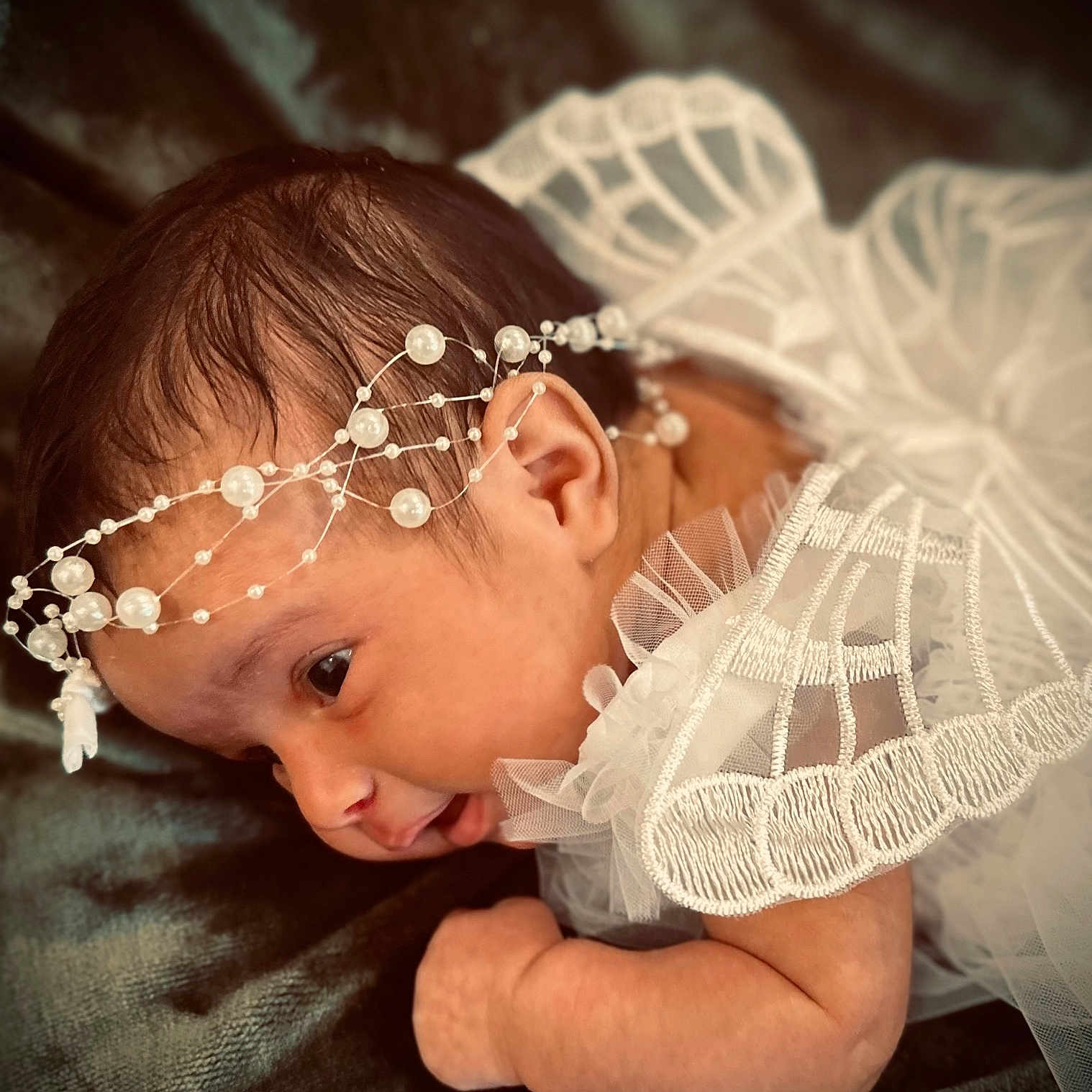 Isabella is registered to the contest to win money with this photo: accessories, baby, bodypart, clothing, dress, face, fashion, finger, formalwear, gown, hand, happy, head, jewelry, necklace, newborn, person, photography, portrait, smile
