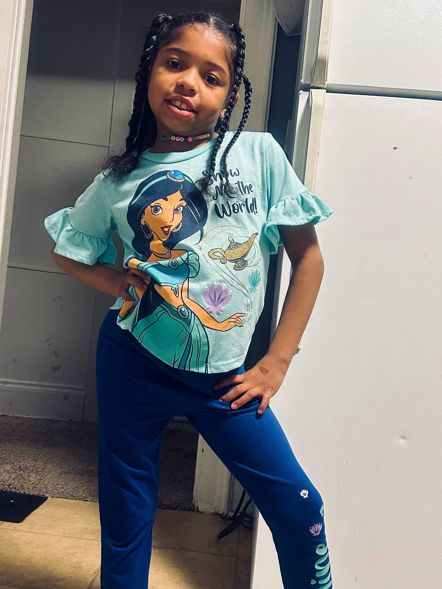 Adrianna is registered to the contest to win money with this photo: arm, denim, eye, eyewear, face, flash_photography, hairstyle, happy, human_body, knee, leg, neck, outerwear, person, shoulder, sleeve, sportswear, standing, t_shirt, thigh