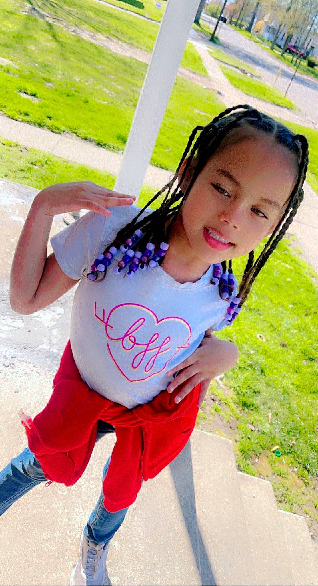 Jamia is registered to the contest to win money with this photo: black_hair, chest, cool, electric_blue, fun, grass, happy, human_leg, knee, leisure, people_in_nature, person, pink, plant, recreation, skin, smile, t_shirt, thigh, trunk