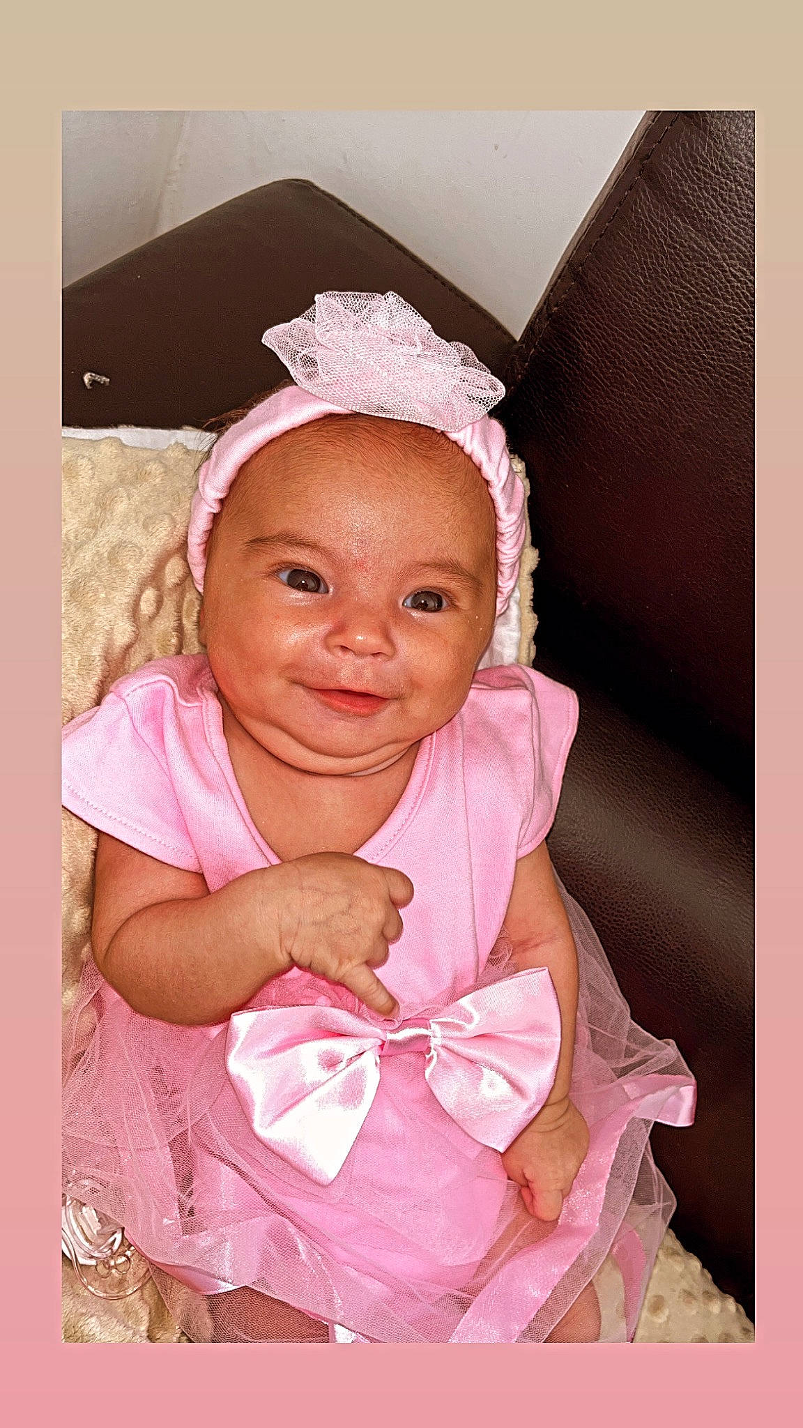 Athenaïs participe au concours pour gagner de l'argent avec cette photo : baby, baby_products, baby_toddler_clothing, cheek, child, fashion_accessory, gesture, happy, headpiece, joy, linens, magenta, peach, person, pink, portrait_photography, purple, skin, sleeve, smile