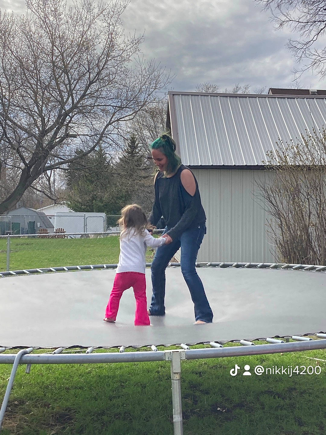 Hazel is registered to the contest to win money with this photo: cloud, fun, grass, house, jeans, joy, lawn, leisure, people_in_nature, person, plant, play, recreation, sky, toddler, tree, walking, yard