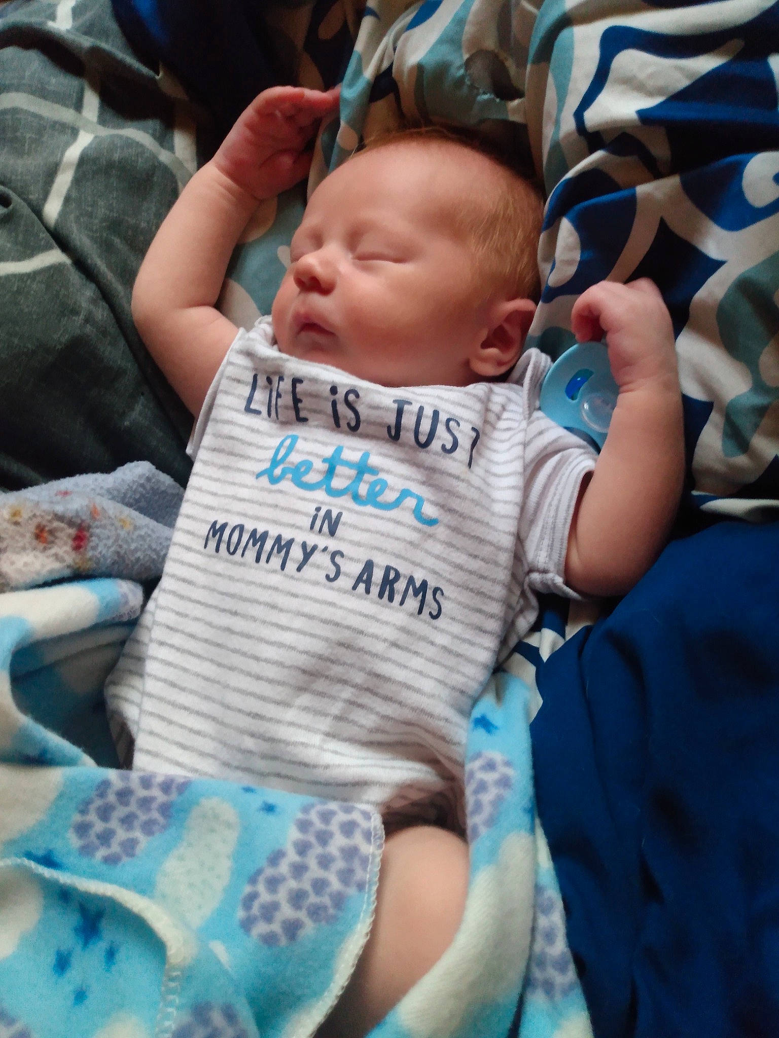 Shane joined the competition — help win amazing prizes! azure, baby, baby_carriage, baby_products, baby_safety, baby_toddler_clothing, blue, cheek, child, comfort, electric_blue, happy, linens, pattern, people, person, sitting, sleeve, t_shirt, textile