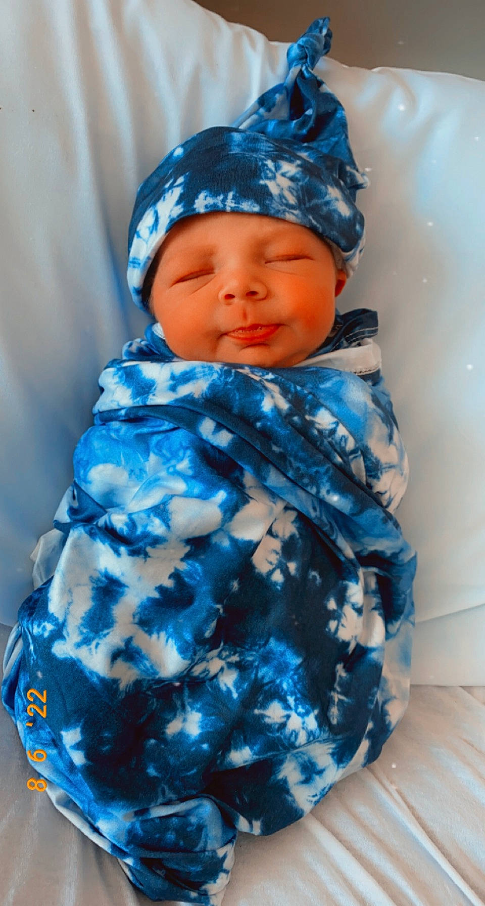 Kashtyn joined the competition — help win amazing prizes! azure, baby, baby_toddler_clothing, beanie, blue, cap, cheek, child, electric_blue, eye, face, fashion_accessory, happy, head, headgear, headwear, pattern, person, purple, sitting
