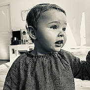 Albane participe au concours pour gagner de l'argent avec cette photo : baby, bodypart, clothing, face, finger, frown, hair, hand, happy, head, indoors, longsleeve, mouth, person, photography, portrait, sad, shirt, sleeve, smile