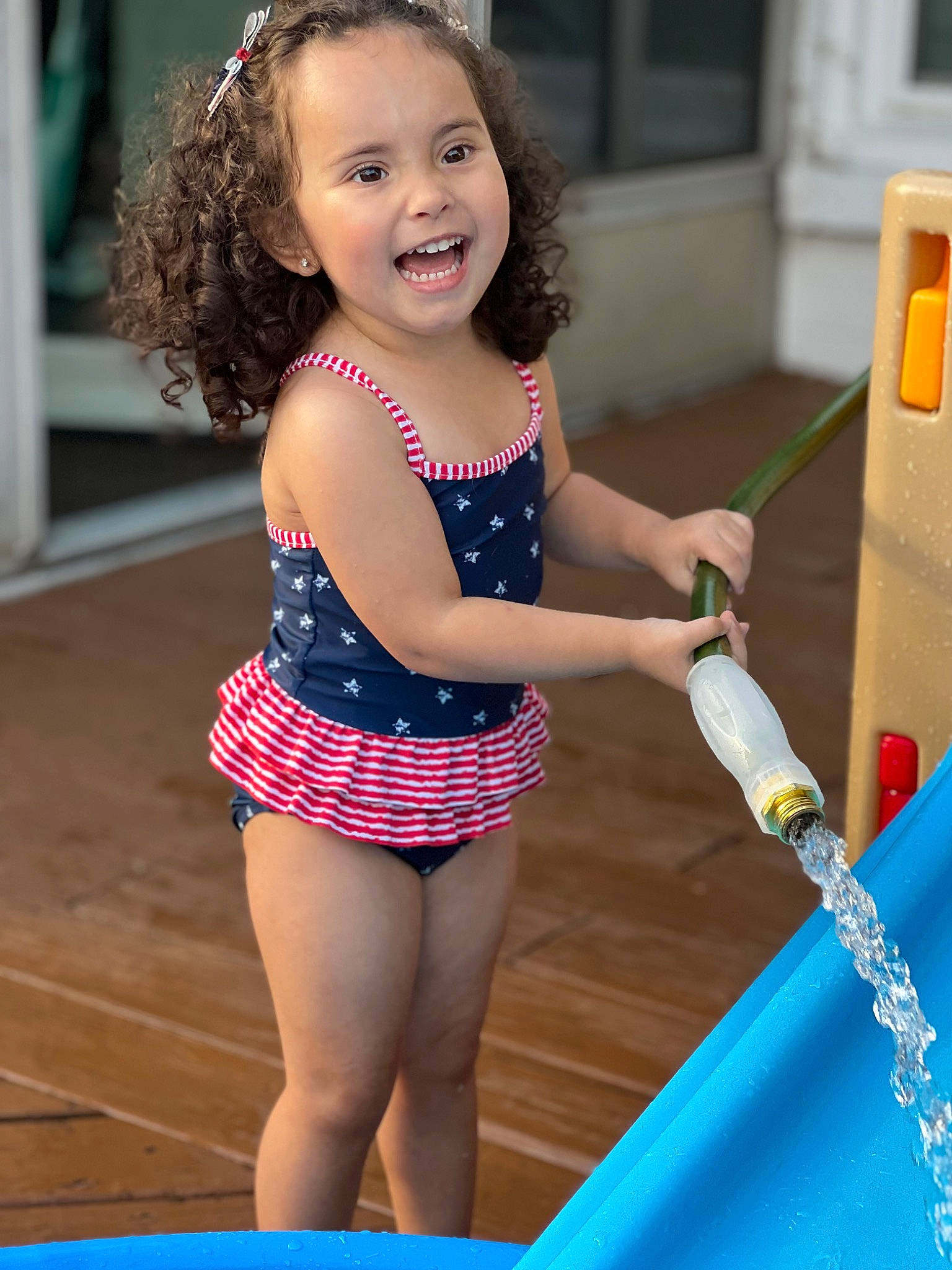 Reign joined the competition — help win amazing prizes! barefoot, beauty, blue, boats_and_boating_equipment_and_supplies, child, electric_blue, fun, happy, human_leg, knee, leisure, pattern, person, play, recreation, smile, sportswear, thigh, toddler, waist