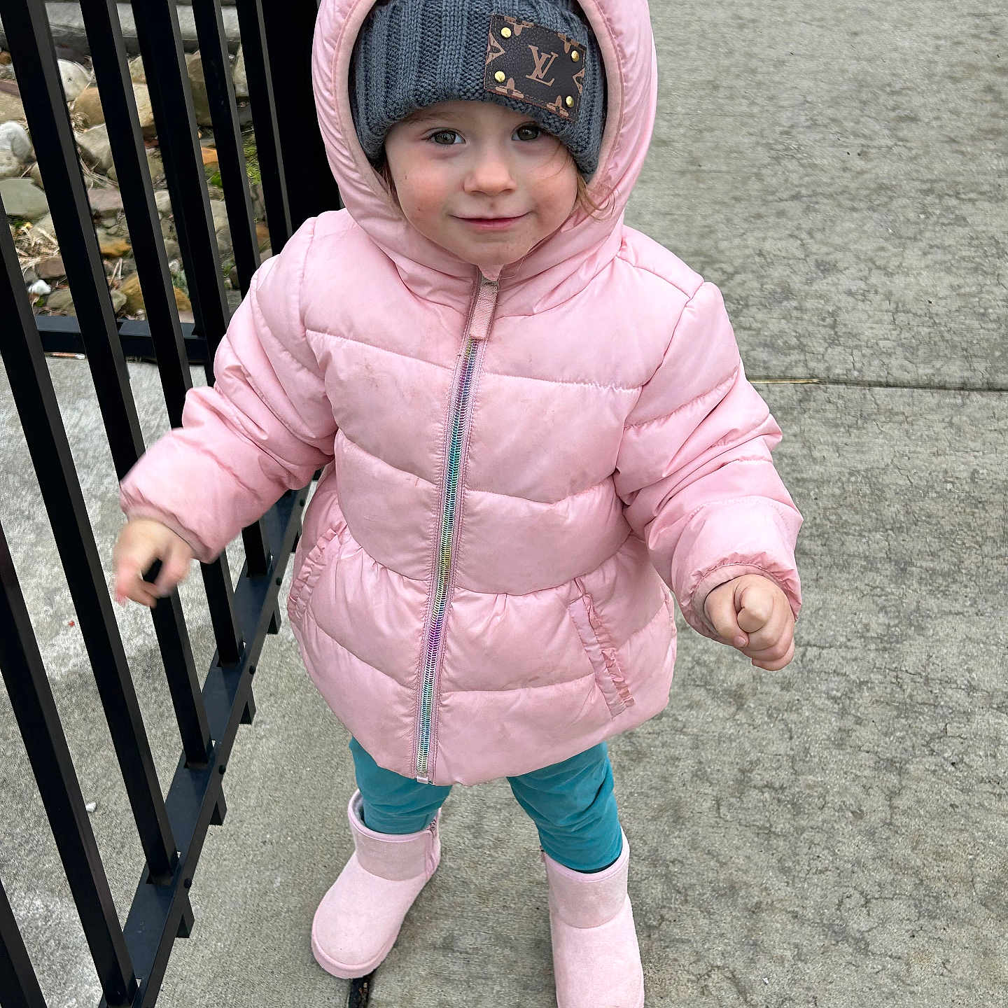 Kandace is registered to the contest to win money with this photo: baby, bonnet, cap, clothing, coat, face, footwear, hat, head, hood, hoodie, jacket, knitwear, pants, person, photography, portrait, shoe, sweater, sweatshirt