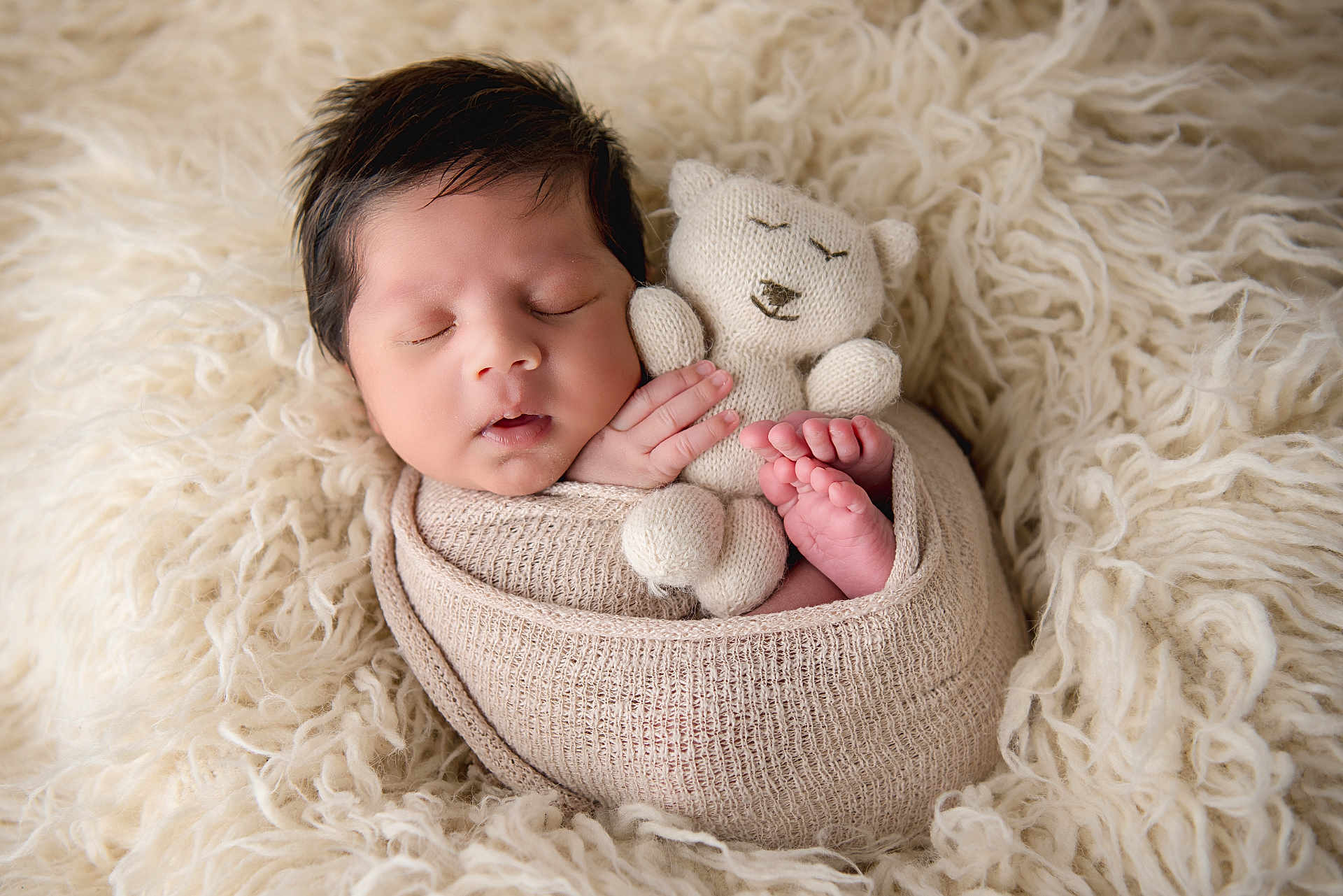 Elijah is registered to the contest to win money with this photo: newborn, baby, sleeping, wrapped, knitted_blanket, teddy_bear, soft_texture, cream_color, peaceful, cute, infant, cozy, portrait, closeup, tiny_feet, hand, fuzzy_background, resting, adorable, child