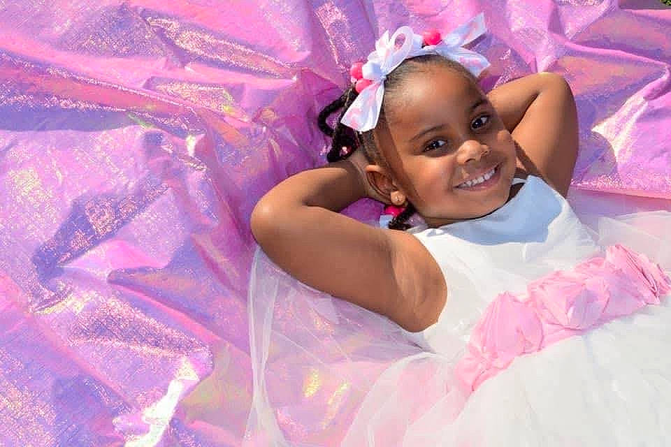 Liyah is registered to the contest to win money with this photo: baby, baby_toddler_clothing, ballet_tutu, child_model, costume_accessory, embellishment, eyelash, facial_expression, hair_accessory, happy, headband, headgear, headpiece, joy, lavender, magenta, person, pink, purple, toddler