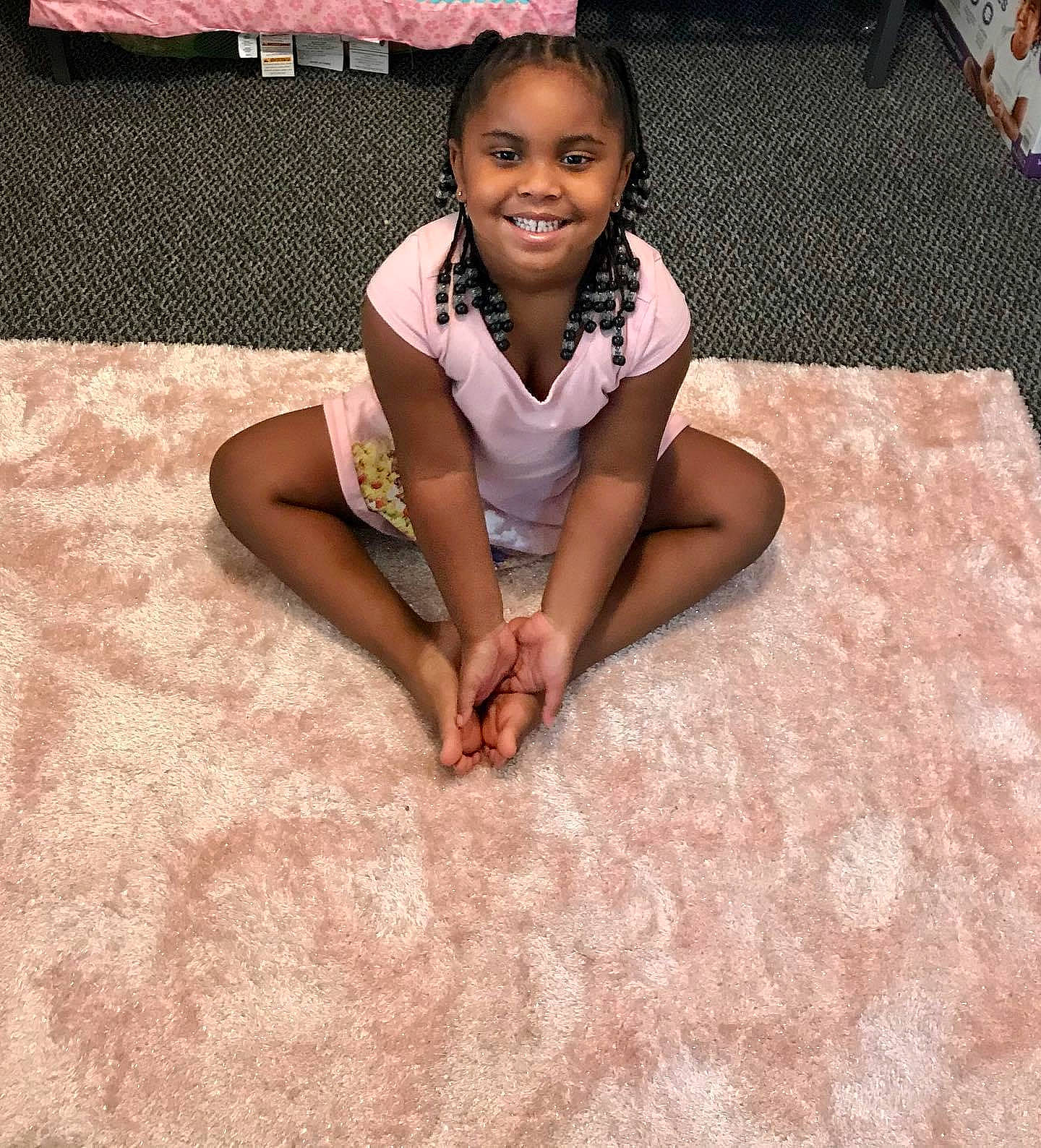 Liyah is registered to the contest to win money with this photo: baby_toddler_clothing, barefoot, child, eye, finger, flooring, foot, happy, joy, laugh, mouth, person, pink, skin, toddler, toe