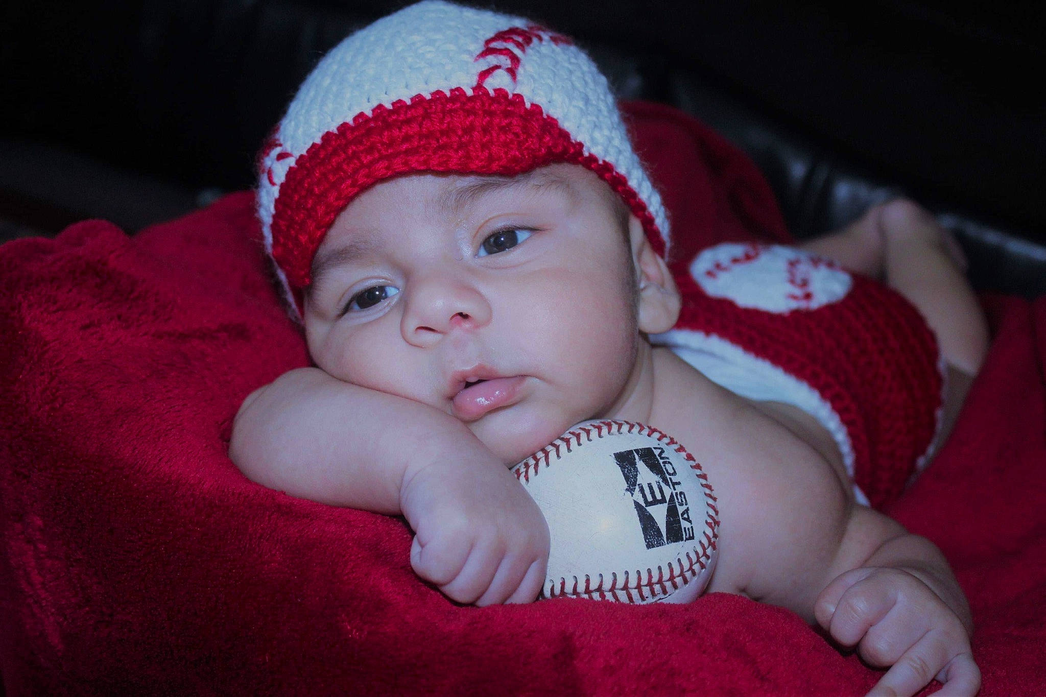 Victor is registered to the contest to win money with this photo: baby, beanie, bonnet, cap, child, headgear, headwear, knit_cap, lip, person, red, skin, toddler