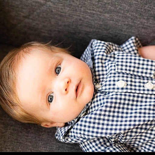 Raleigh is registered to the contest to win money with this photo: baby, cheek, child, child_model, design, ear, eye, face, head, iris, lip, nose, pattern, person, photography, plaid, portrait, portrait_photography, skin, toddler