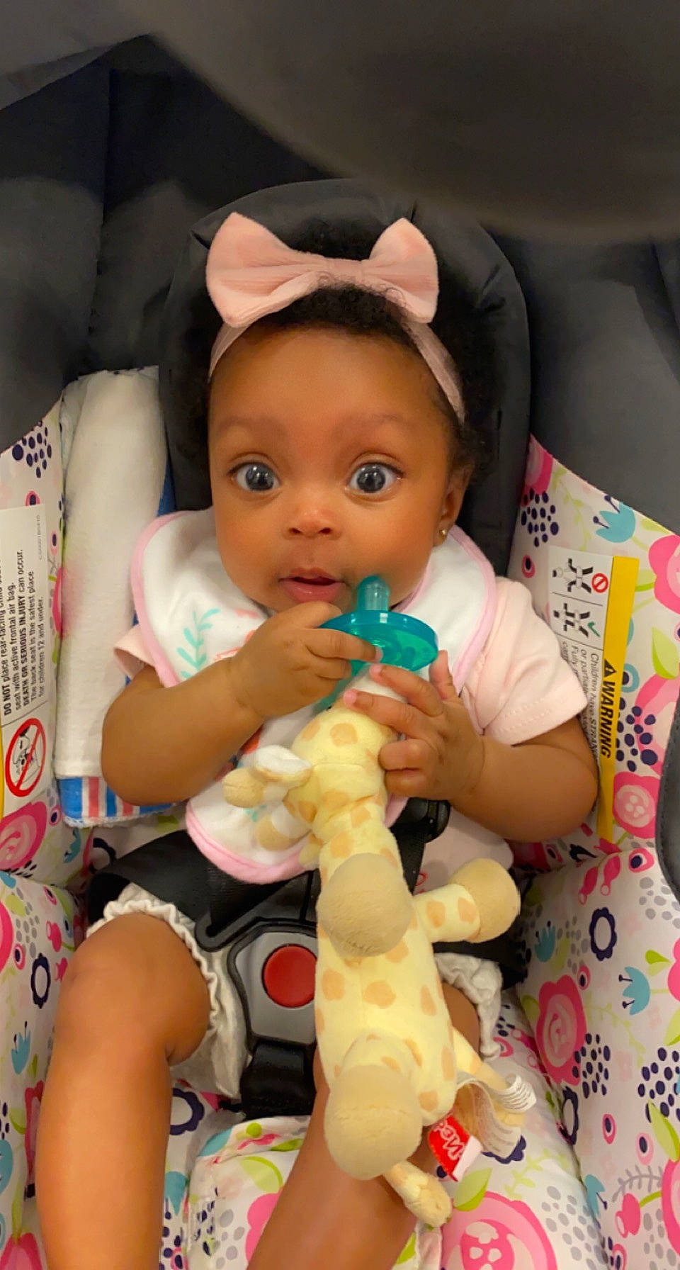 Adora joined the competition — help win amazing prizes! arm, baby, baby_carriage, baby_products, baby_toddler_clothing, cheek, child, comfort, facial_expression, finger, fun, mammal, organ, person, pink, room, skin, surprise, textile, toddler