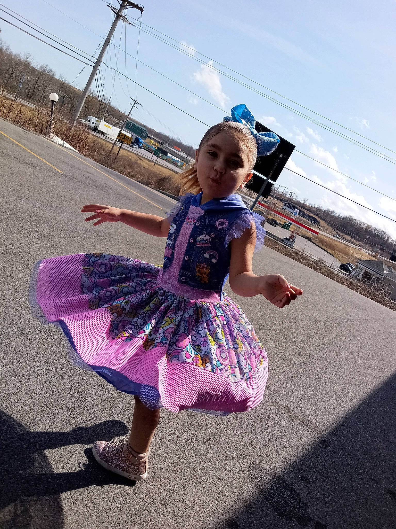 Jordynn is registered to the contest to win money with this photo: asphalt, child, cloud, entertainment, event, fashion_accessory, fun, happy, leisure, magenta, pattern, pedestrian, person, road, sky, spring, street, street_fashion, toddler, travel