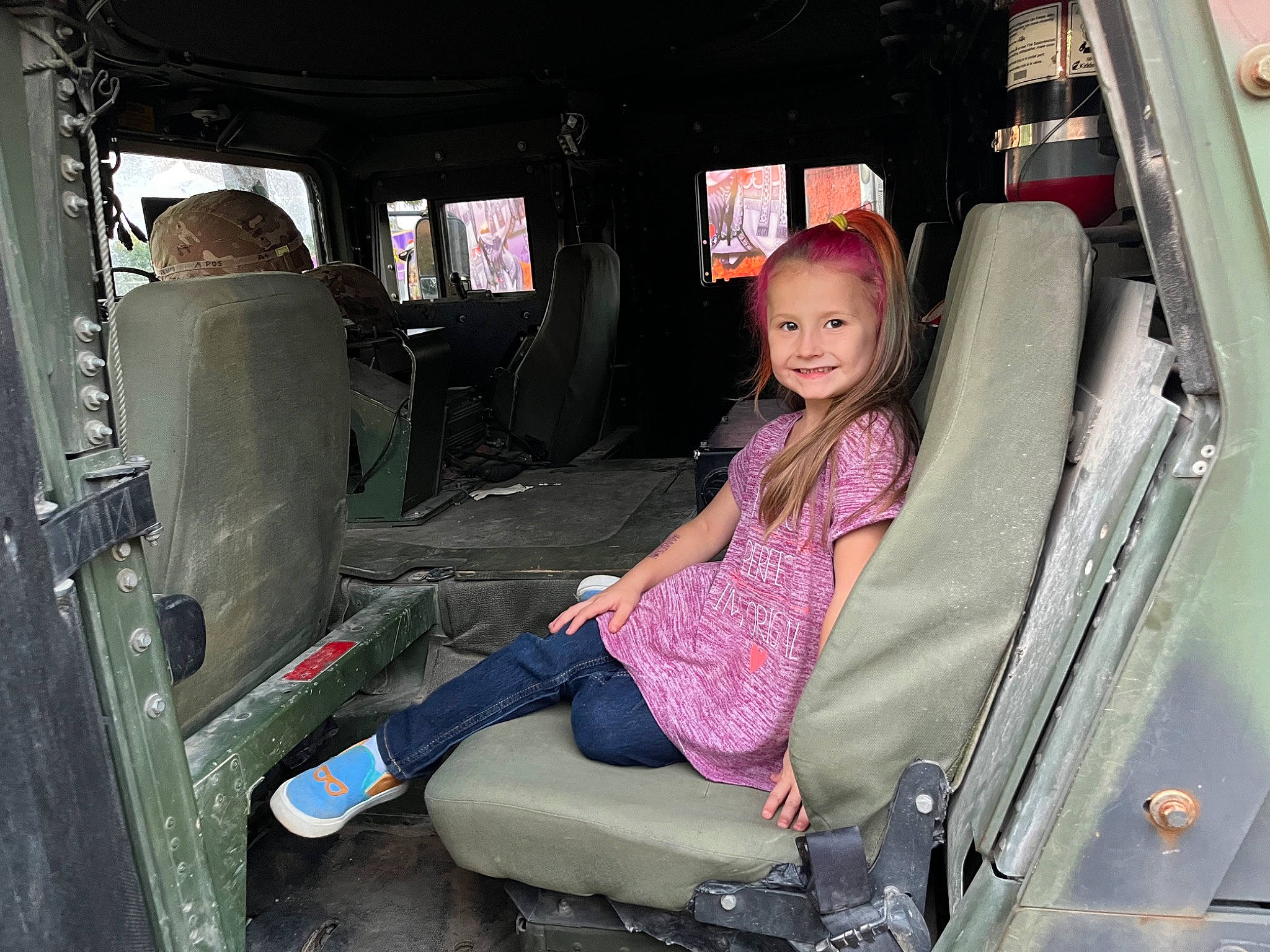 Aria is registered to the contest to win money with this photo: airline, auto_part, automotive_design, automotive_exterior, car_seat, car_seat_cover, family_car, fun, head_restraint, human_leg, joy, luxury_vehicle, mode_of_transport, motor_vehicle, passenger, person, smile, toddler, transport, travel