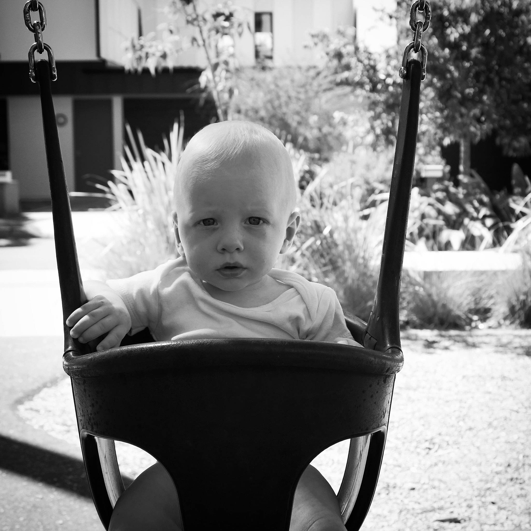 Bodhi joined the competition — help win amazing prizes! baby, black, black_and_white, child, city, fun, hair, happy, human, human_body, monochrome, monochrome_photography, person, plant, sitting, smile, standing, style, toddler, tree