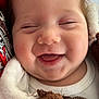 baby, blanket, child, close_up, clothing, cozy, cute, face, happy, head, infant, joyful, mouth_open, portrait, skin, sleepy, smiling, soft, warm, young