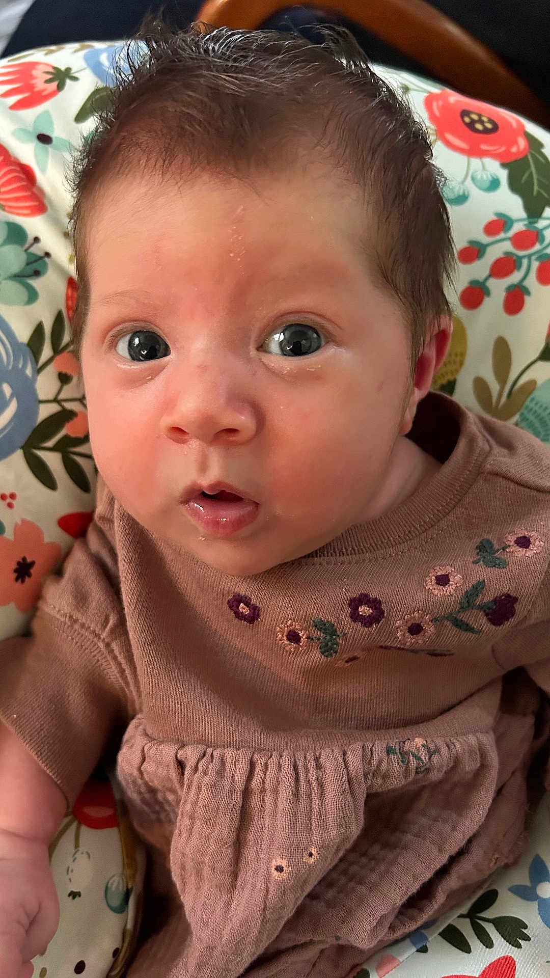 Aurora joined the competition — help win amazing prizes! baby, infant, face, expression, clothing, dress, embroidery, floral, cushion, pattern, colorful, skin, eyes, hair, mouth, cute, indoors, portrait, child, person
