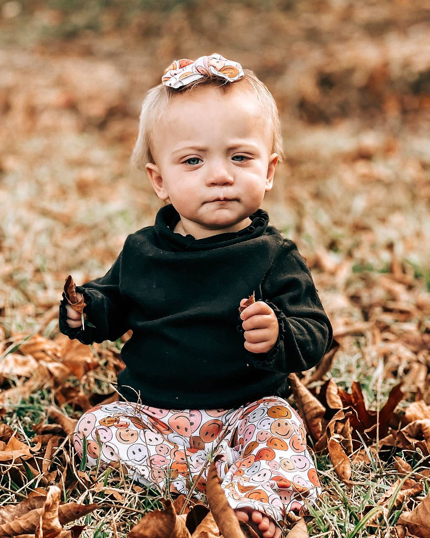 Everly joined the competition — help win amazing prizes! autumn, baby, baby_toddler_clothing, child, child_model, flash_photography, grass, happy, people_in_nature, person, photo_shoot, plant, portrait, portrait_photography, sitting, sorrow, sunlight, toddler, tree, wood