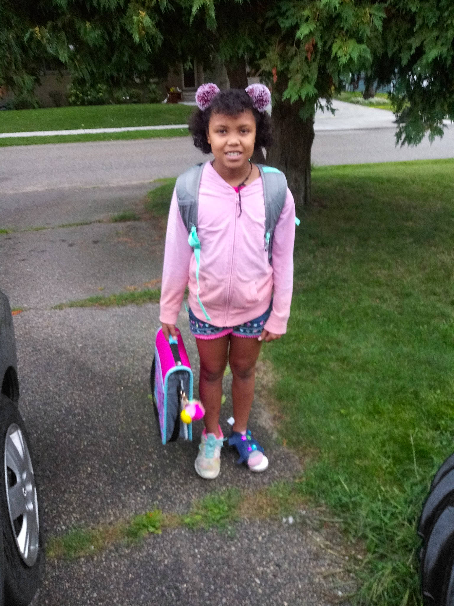 Rabeka is registered to the contest to win money with this photo: auto_part, automotive_wheel_system, bicycle, bicycle_accessory, child, grass, joy, kick_scooter, person, pink, plant, play, recreation, smile, toddler, training_wheels, vacation, vehicle, wheel