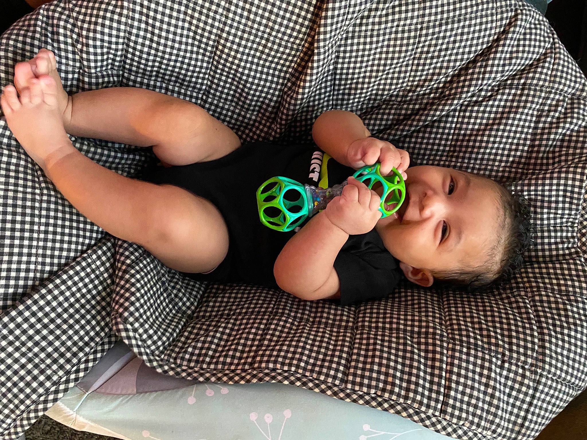 Nasir joined the competition — help win amazing prizes! baby, baby_products, baby_toddler_clothing, cheek, child, comfort, facial_expression, finger, hand, headgear, human_body, leg, mouth, pattern, person, sitting, skin, sleeve, thigh, toddler