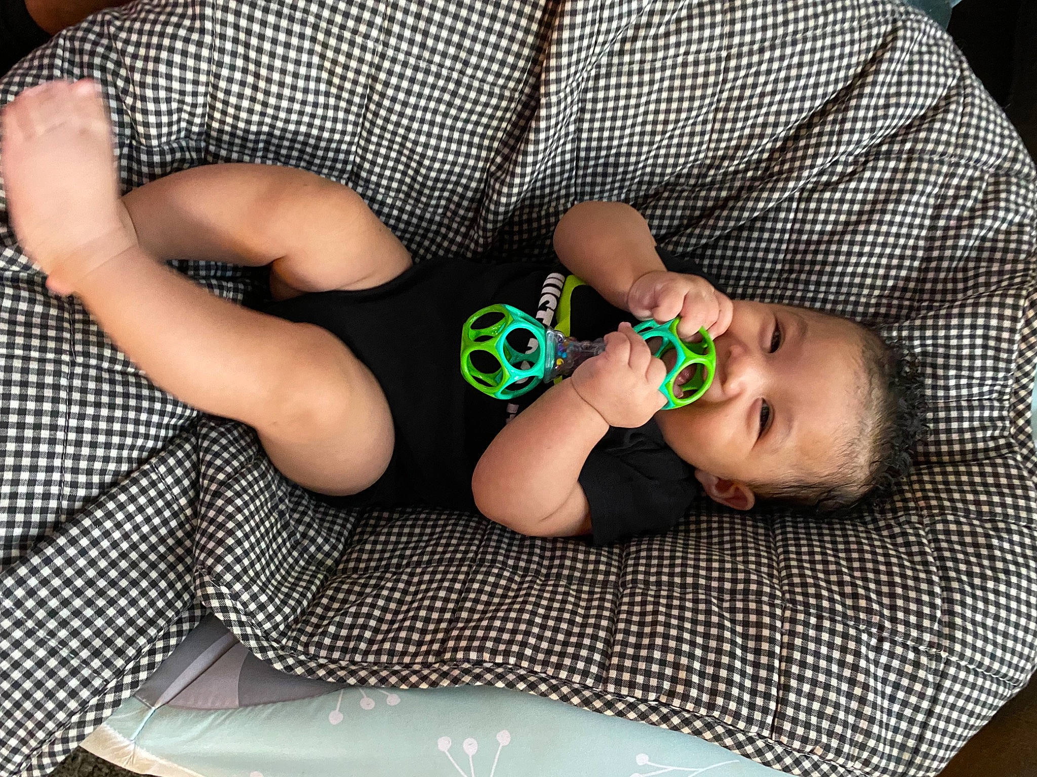 Nasir joined the competition — help win amazing prizes! arm, baby, baby_toddler_clothing, child, comfort, facial_expression, finger, hand, human_body, joint, leg, mammal, mouth, pattern, person, skin, sleeve, sunglasses, textile, thigh