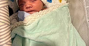 Luka joined the competition — help win amazing prizes! baby, bear_hat, bedding, blanket, cozy, crib, cute, face, hat, indoors, infant, mint_green, newborn, nursery, peaceful, photography, portrait, resting, sleeping, swaddle