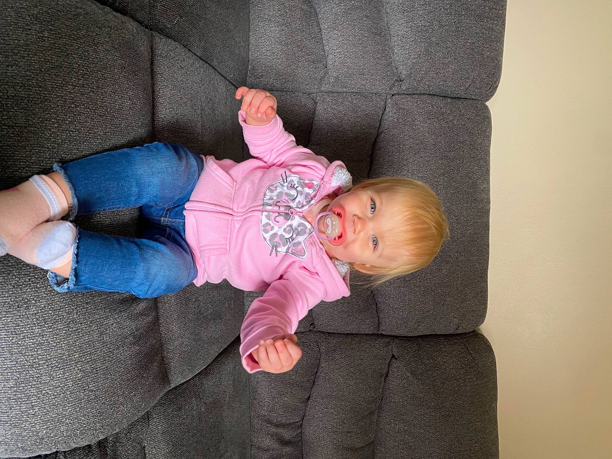Avery is registered to the contest to win money with this photo: baby, baby_products, baby_toddler_clothing, cheek, child, comfort, couch, foot, hand, lap, leg, linens, person, product, room, sitting, skin, sleeve, sock, toddler