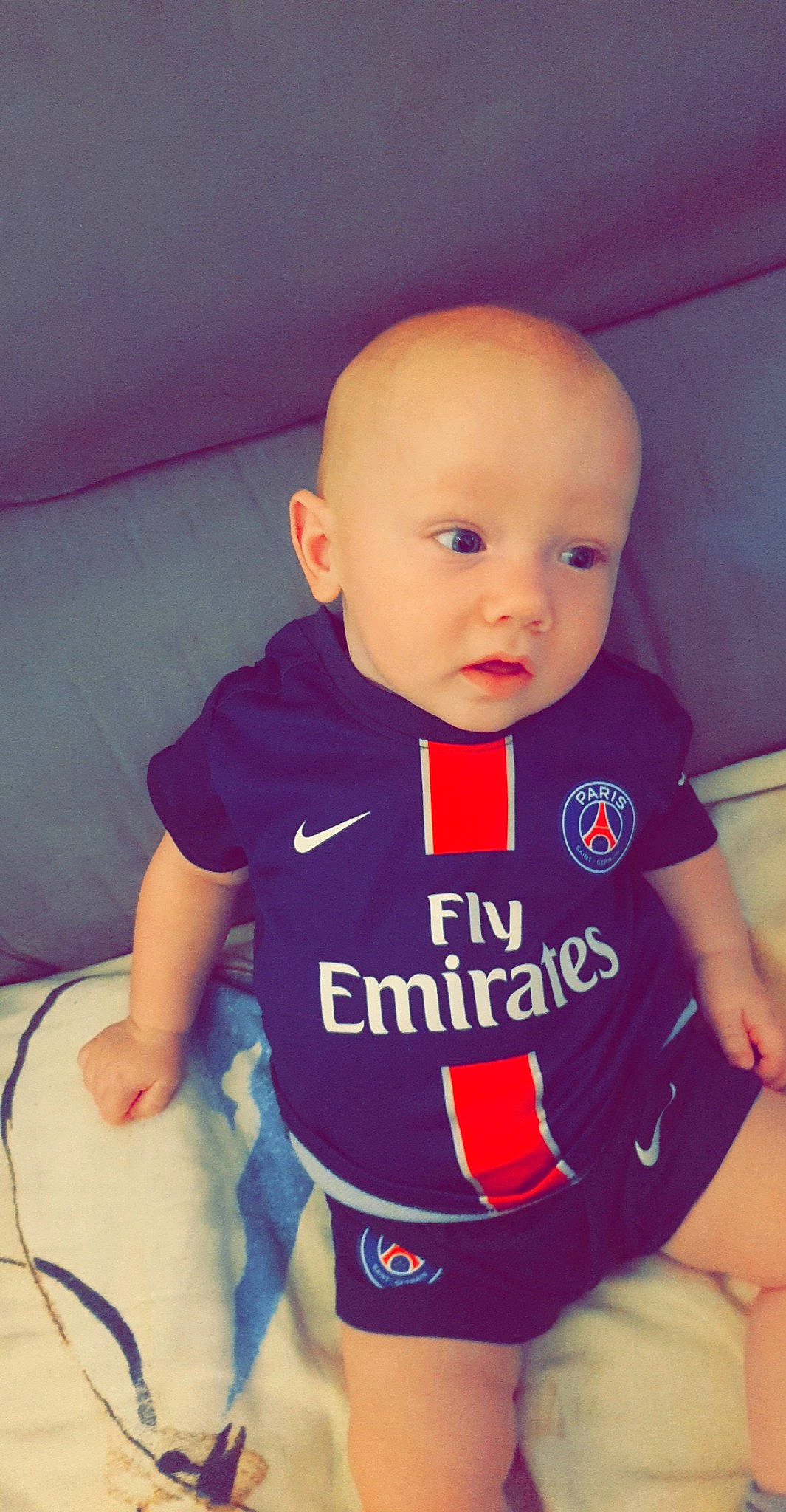 Christophe a rejoint le concours — aidez-le/la à gagner de superbes lots ! arm, baby, baby_products, baby_toddler_clothing, cheek, child, ear, eye, face, forehead, head, nose, person, product, purple, skin, sleeve, smile, standing, t_shirt