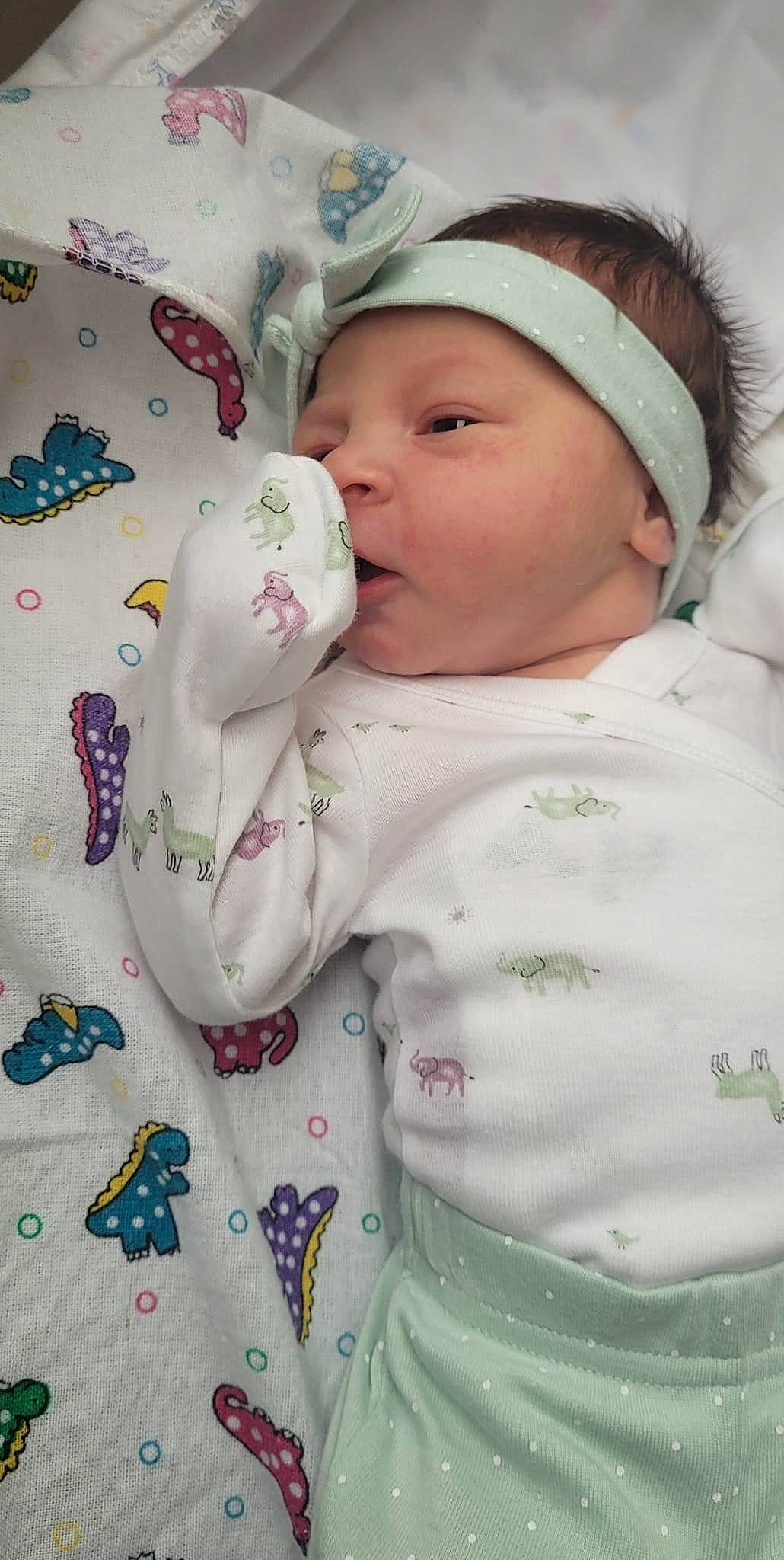 Elianna joined the competition — help win amazing prizes! baby, baby_products, baby_sleeping, baby_toddler_clothing, cap, cheek, child, face, grass, happy, hat, headwear, linens, pattern, person, pink, skin, sleeve, toddler, white