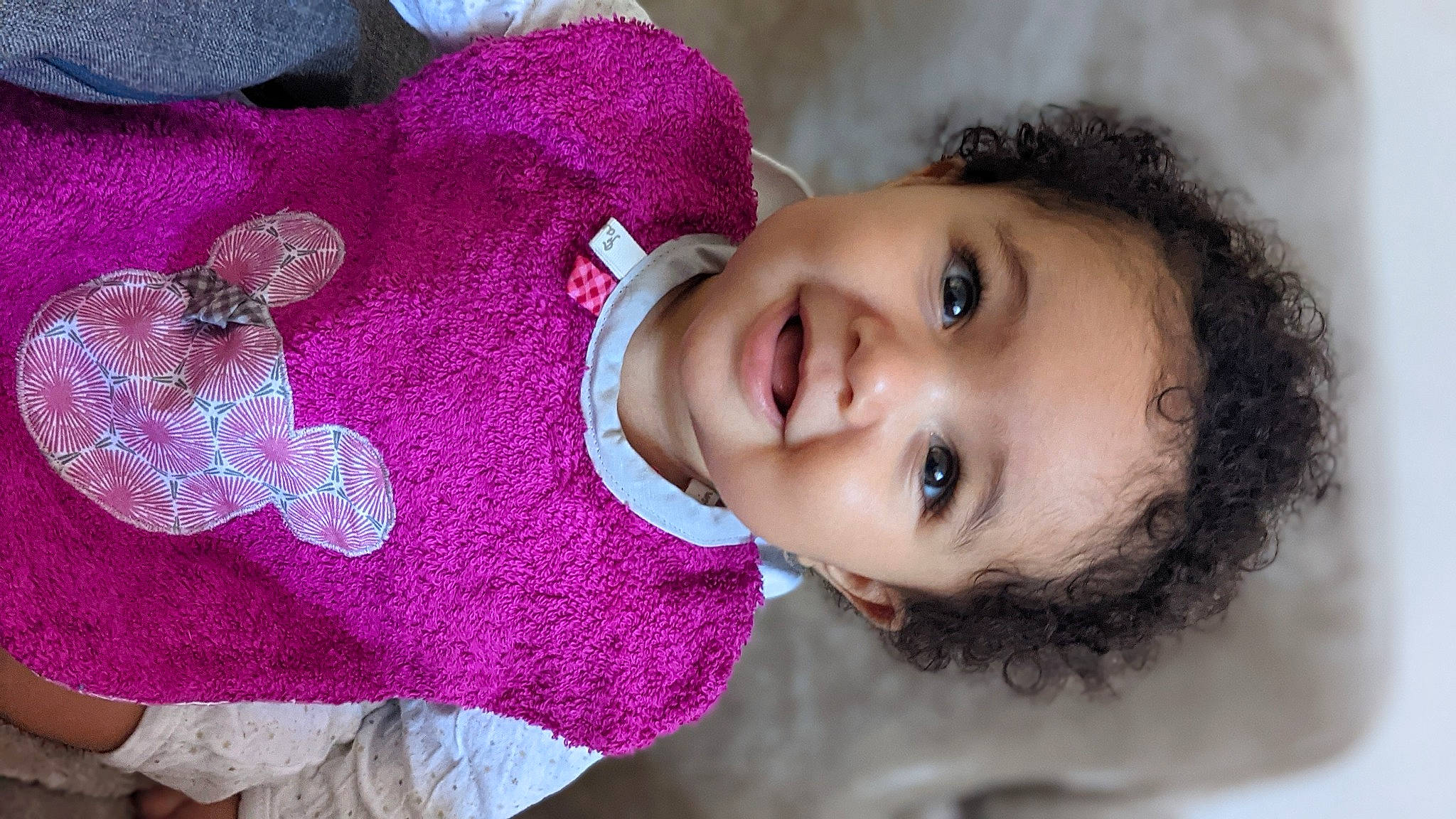 Aylee participe au concours pour gagner de l'argent avec cette photo : baby_toddler_clothing, cheek, chin, dress, eye, eyebrow, eyelash, face, flash_photography, hand, head, human, iris, joy, lip, neck, nose, person, plant, skin