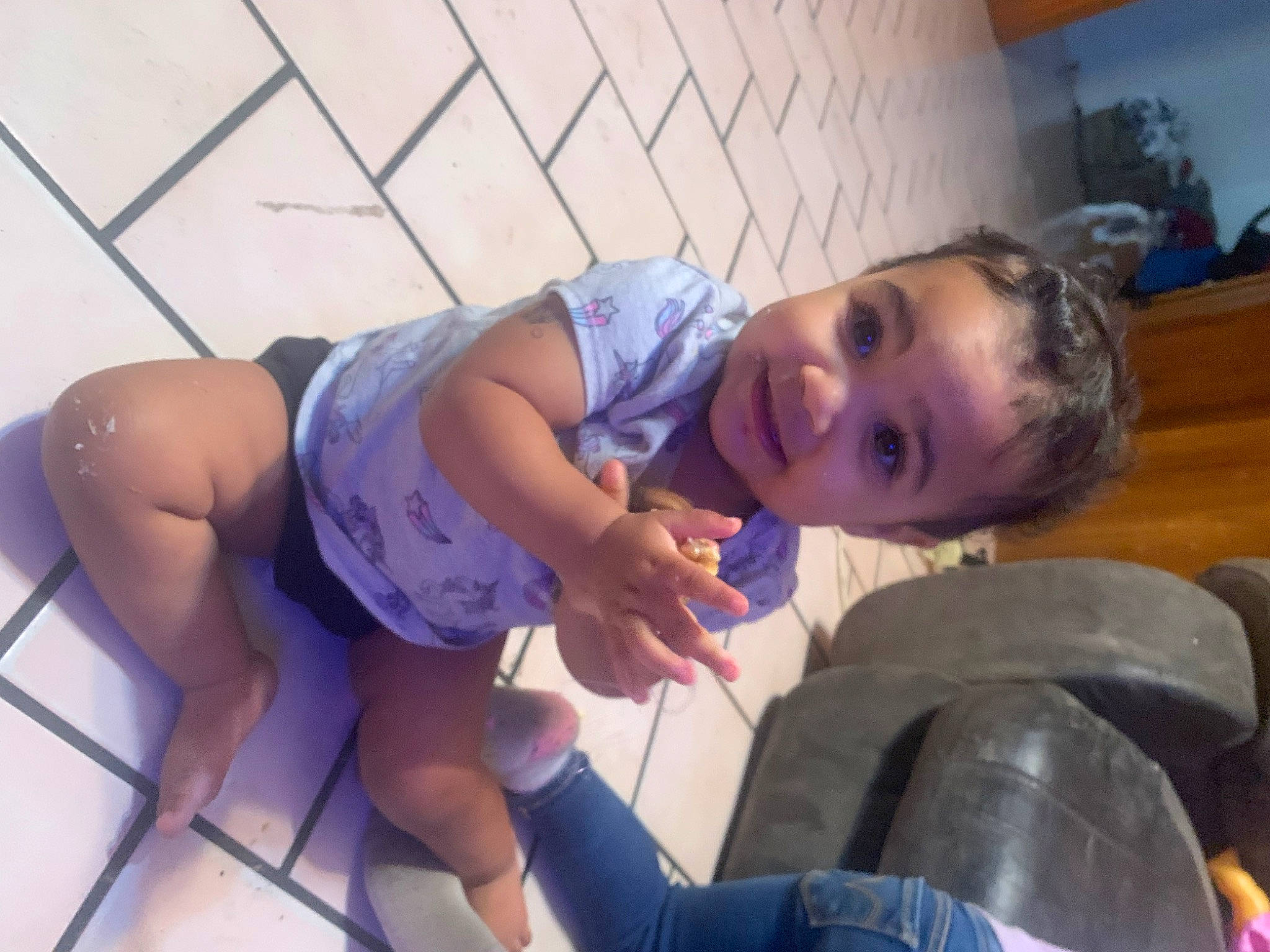 Amelia is registered to the contest to win money with this photo: black_hair, chest, child, comfort, elbow, electric_blue, fun, hair, hairstyle, happy, human_leg, joy, knee, leisure, leotard, mouth, person, sitting, smile, thigh