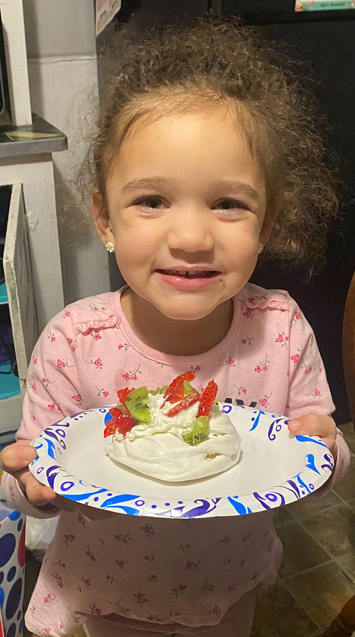 Luna is registered to the contest to win money with this photo: birthday_cake, cake_decorating, cheek, child, cuisine, dish, dishware, event, eyelash, face, food, happy, ingredient, joy, nose, person, plate, smile, sugar_cake, sweetness
