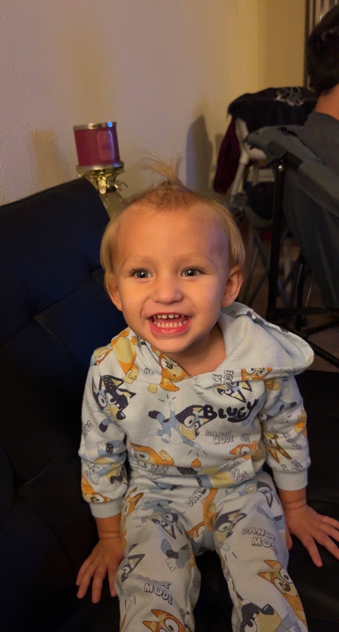 Isaiah is registered to the contest to win money with this photo: baby, baby_toddler_clothing, chair, cheek, child, comfort, couch, eye, flooring, fun, happy, head, iris, joy, luggage_and_bags, person, room, sitting, skin, sleeve