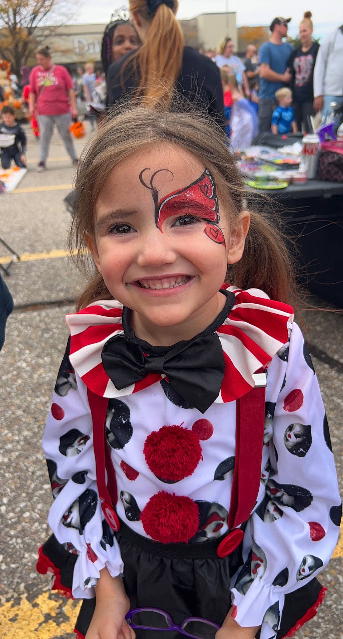 Emma joined the competition — help win amazing prizes! blurred, child, costume, entertainment, event, festival, fictional_character, fun, happy, joy, laugh, pattern, performing_arts, person, pink, public_event, recreation, red, smile, street