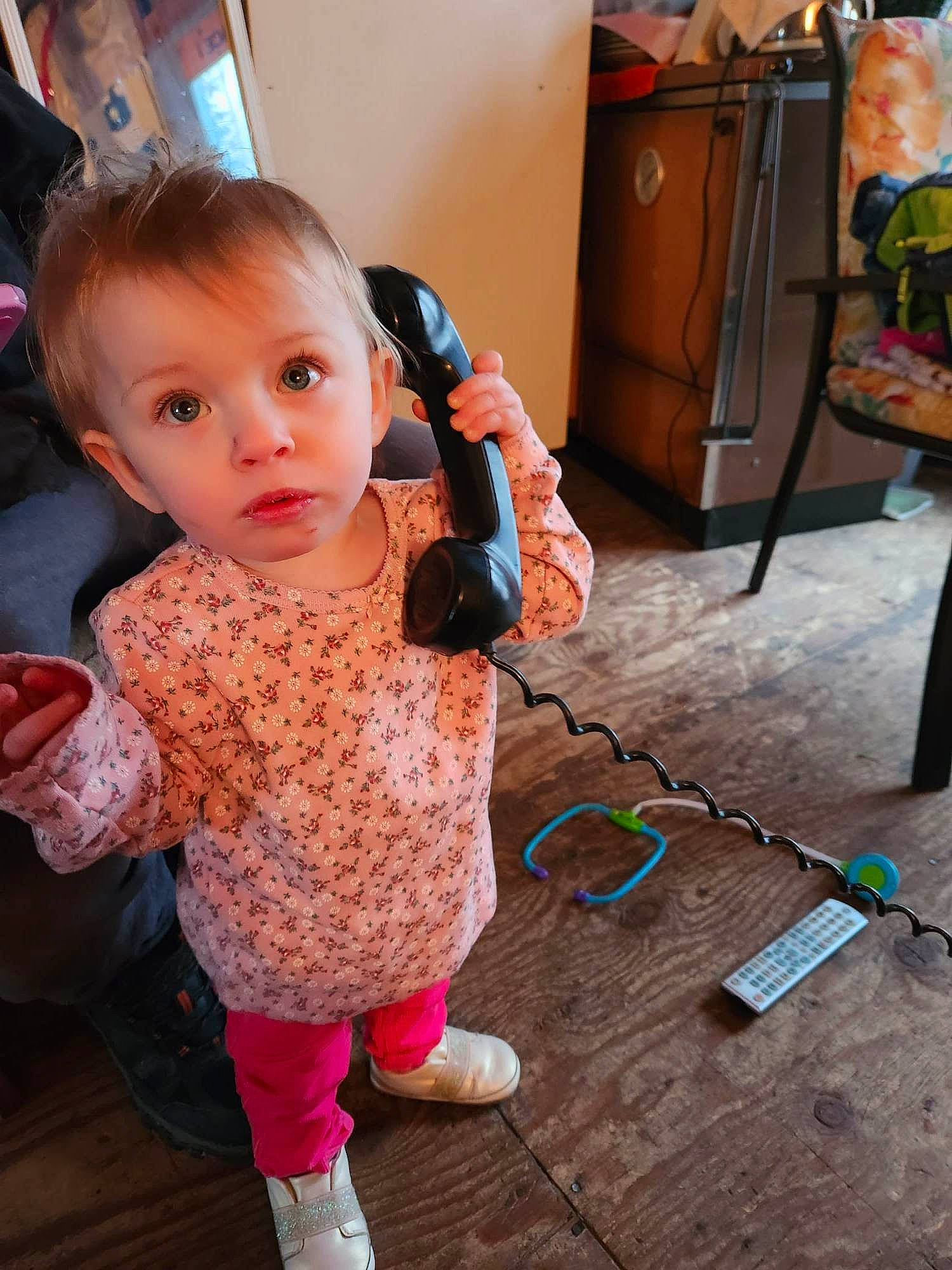 Gracelynn joined the competition — help win amazing prizes! audio_equipment, baby, baby_toddler_clothing, child, floor, flooring, fun, happy, hardwood, pattern, person, play, room, shoe, sitting, skin, sleeve, thumb, toddler, toy