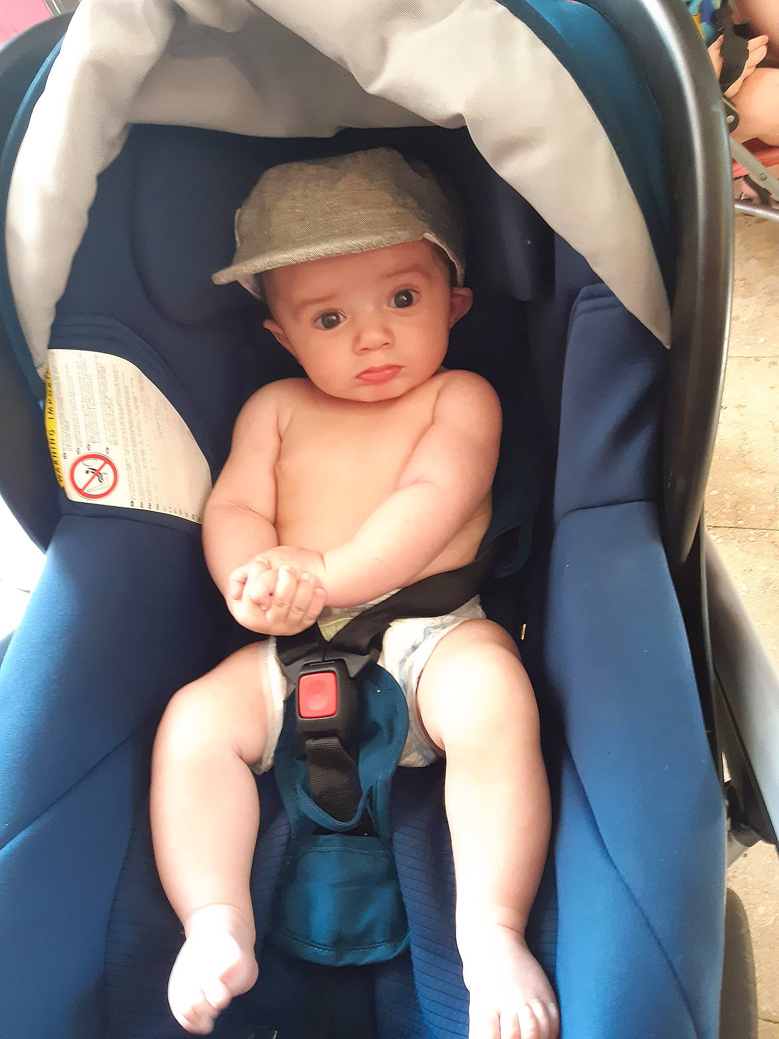 Djulyan a rejoint le concours — aidez-le/la à gagner de superbes lots ! auto_part, baby, baby_carriage, baby_carrier, baby_in_car_seat, baby_products, car_seat, child, headwear, person, product, sitting, toddler