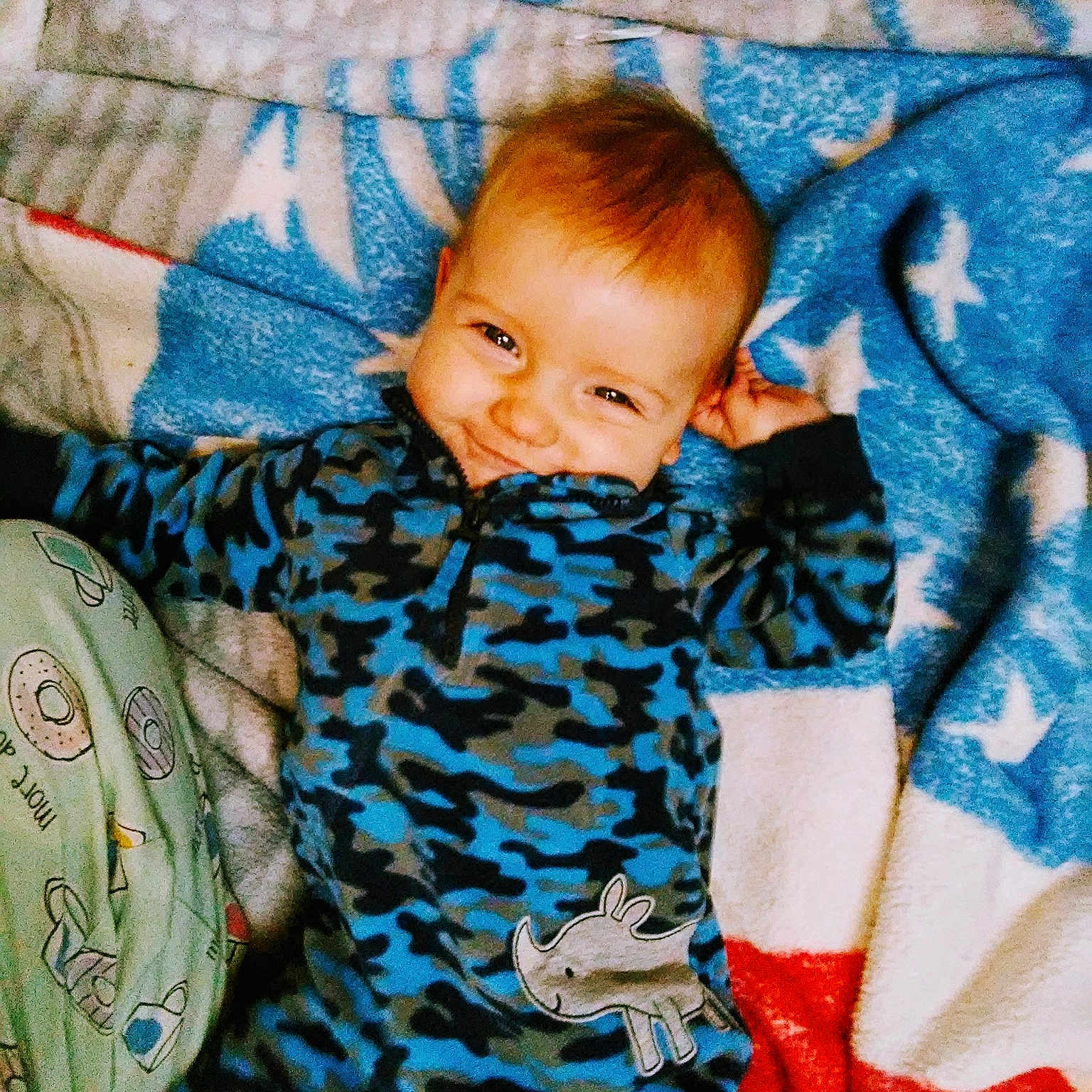 Timothy is registered to the contest to win money with this photo: baby, blanket, cheek, child, joy, linens, person, skin, sleep, smile, textile, toddler
