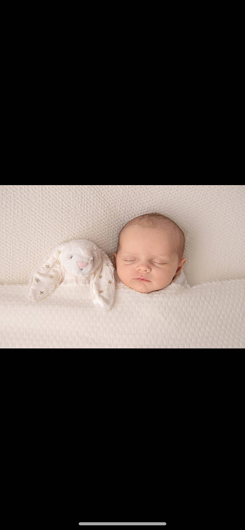 Lola joined the competition — help win amazing prizes! baby, baby_products, baby_sleeping, baby_toddler_clothing, cheek, child, comfort, eyebrow, fur, happy, headgear, linens, mammal, person, portrait_photography, room, sitting, sleeve, t_shirt, toddler