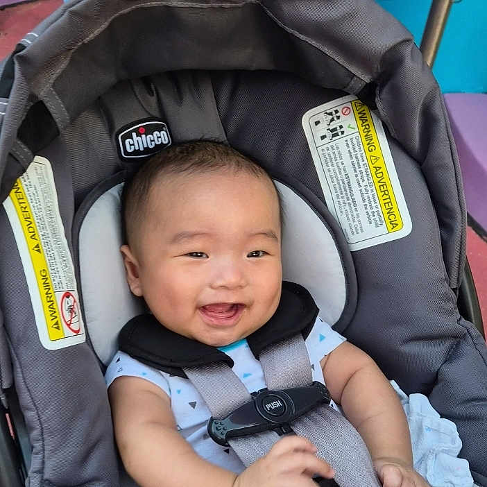 Max joined the competition — help win amazing prizes! baby, smiling, stroller, chicco, child, infant, happiness, seatbelt, gray, clothing, cute, portrait, safety, hands, head, face, outdoor, colorful, young, person