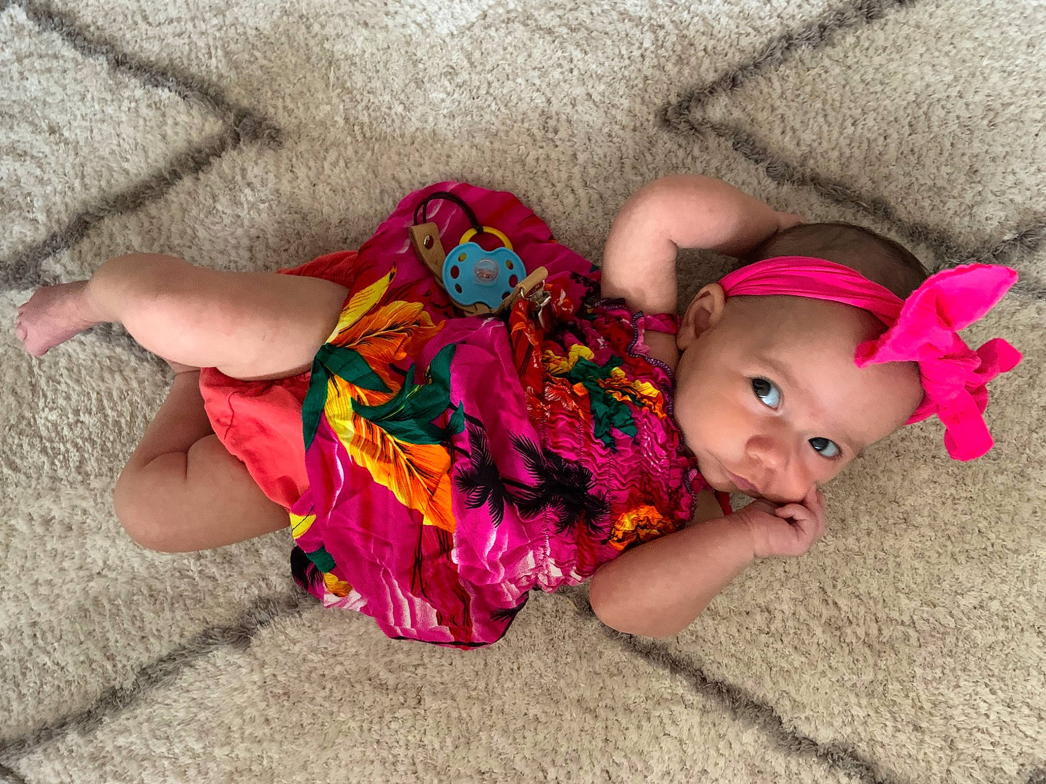 Azalea is registered to the contest to win money with this photo: baby_toddler_clothing, child, doll, finger, foot, fun, grass, happy, head, headgear, headwear, human_leg, joint, leg, magenta, person, pink, skin, thigh, toddler