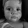 Mylan a rejoint le concours — aidez-le/la à gagner de superbes lots ! baby, black_and_white, child, closeup, expression, eyes, face, freckles, hair, head, indoors, innocence, monochrome, person, portrait, shoulders, skin, texture, towel, young