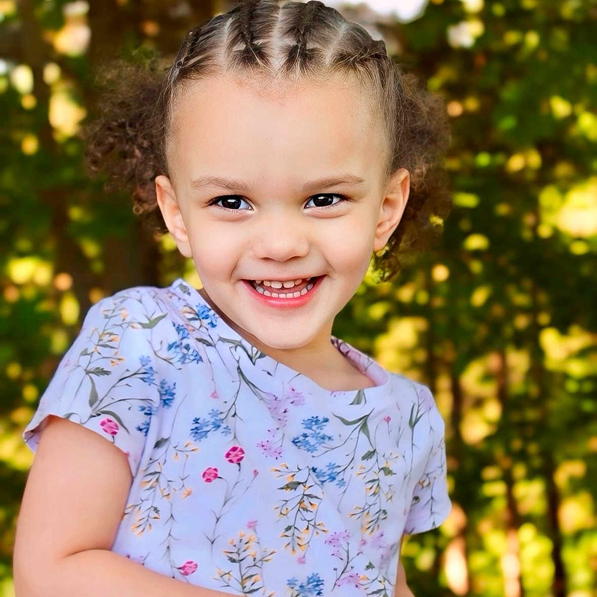Kora is registered to the contest to win money with this photo: bodypart, child, clothing, dress, face, female, girl, hair, happy, head, laughing, mouth, person, photography, plant, portrait, smile, teeth, tree, vegetation