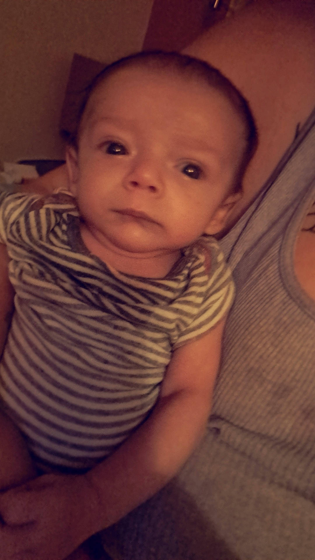 Ariah is registered to the contest to win money with this photo: baby, cheek, chin, comfort, eyebrow, face, facial_expression, finger, forehead, head, human_body, iris, lip, mammal, mouth, neck, nose, person, skin, sleeve